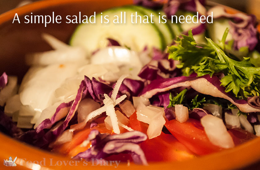 A nice, sharp, onions and tomato salad